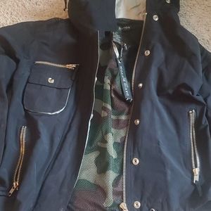 Black and silver camouflage rain coat